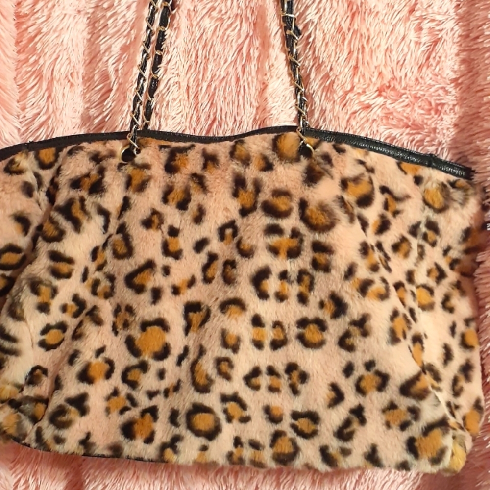Pink and black fur purse